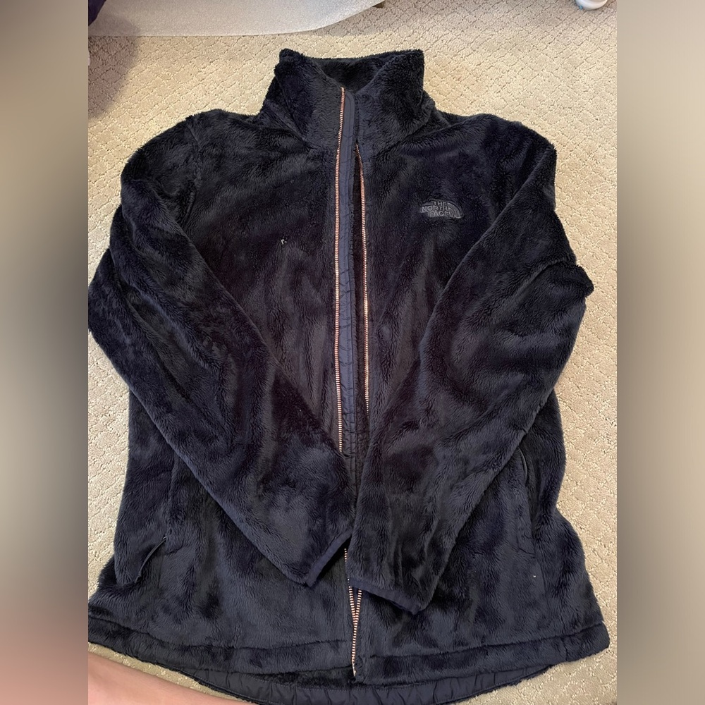 Navy fuzzy north face jacket